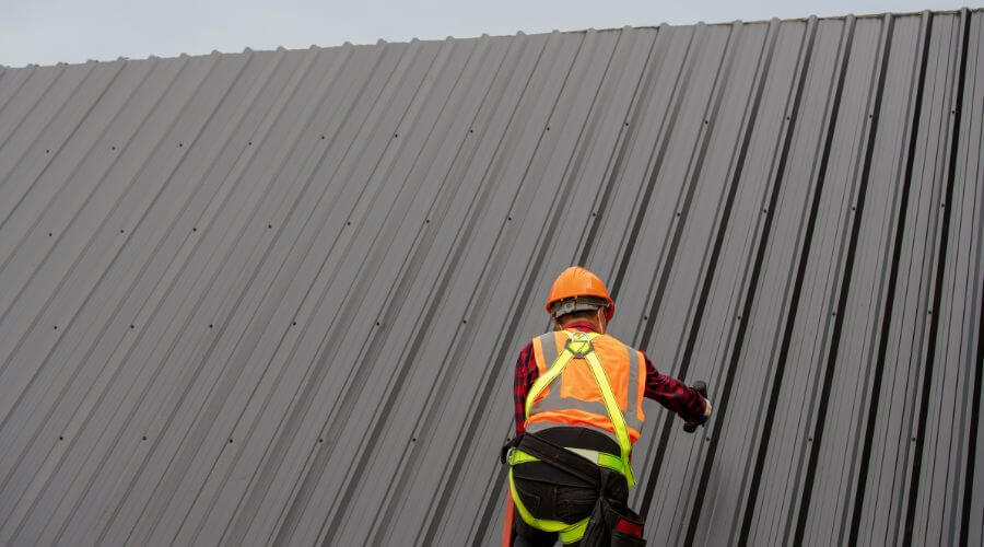 Professional metal roof installation services in Manilla, IN